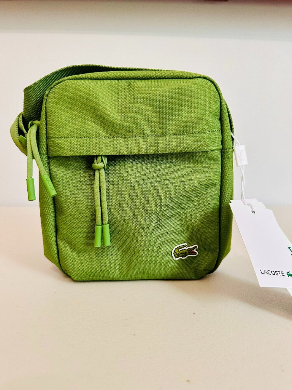 LACOSTE NEOCROC MACHE GREEN VERTICAL CAMERA CROSSBODY BAG UNISEX